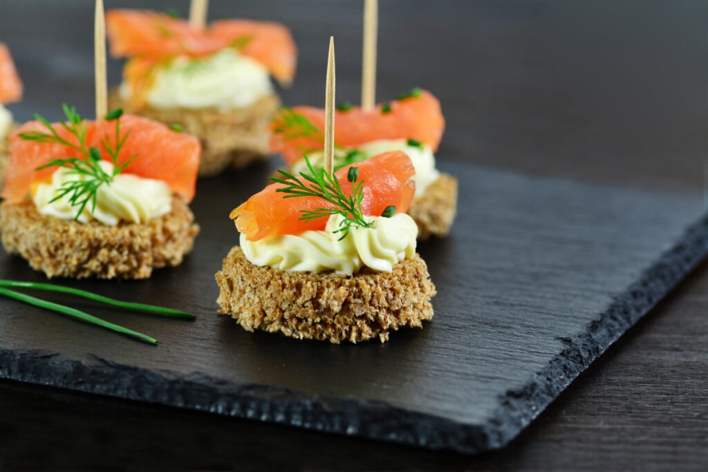 Smoked,Salmon,Canapes,With,Cheese,Cream,And,Dill,On,Brown